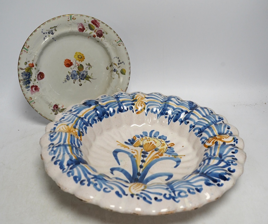 An Italian maiolica dish and a Masons Ironstone floral plate, largest 30cm in diameter (2). Condition - fair